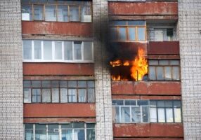 A big fire in one of the apartments of a large tenement-house