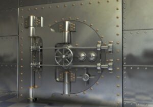 Opened Antique iron safe isolated on white background